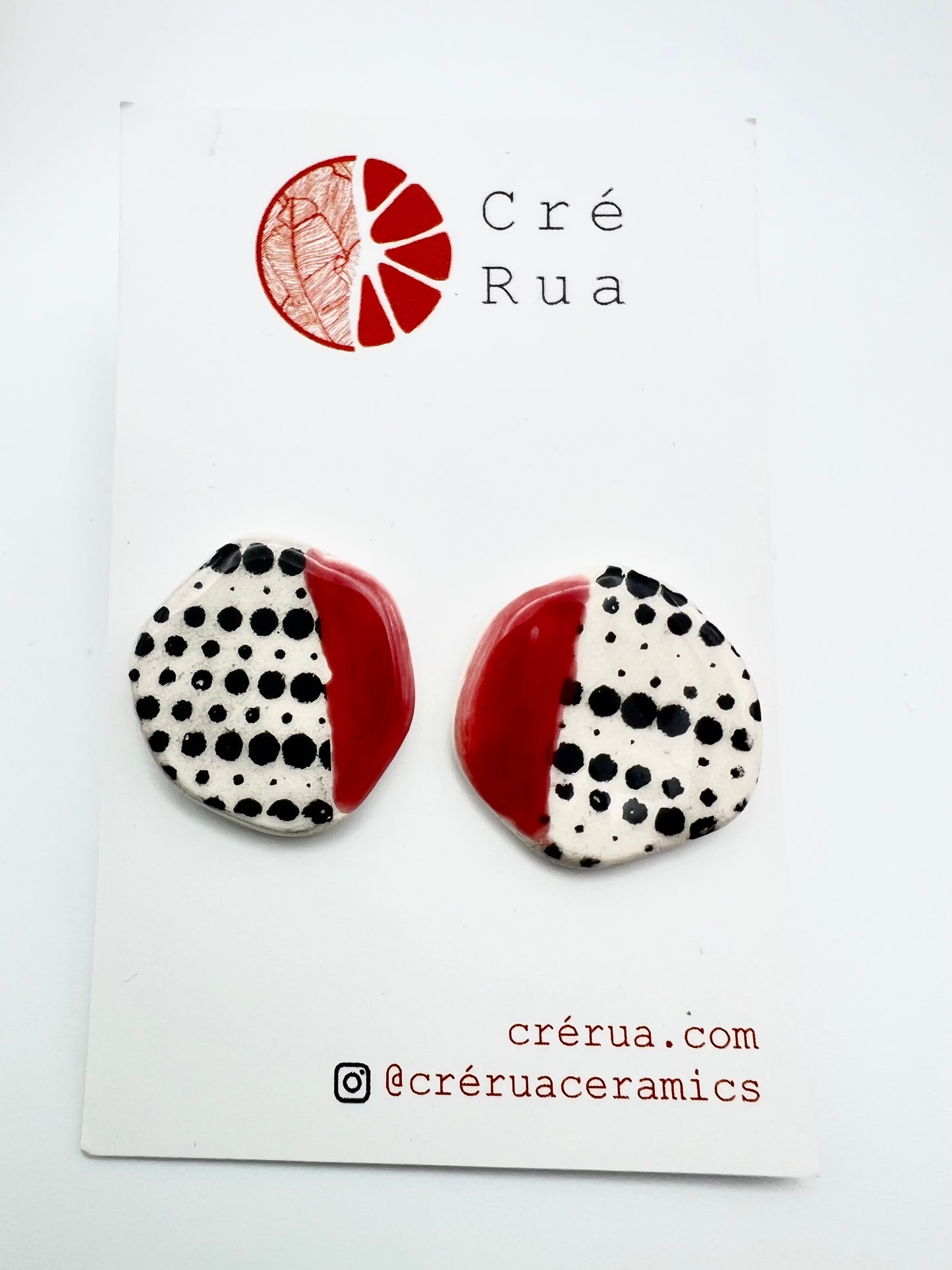 Abstract Stud - Rose and black dotted print